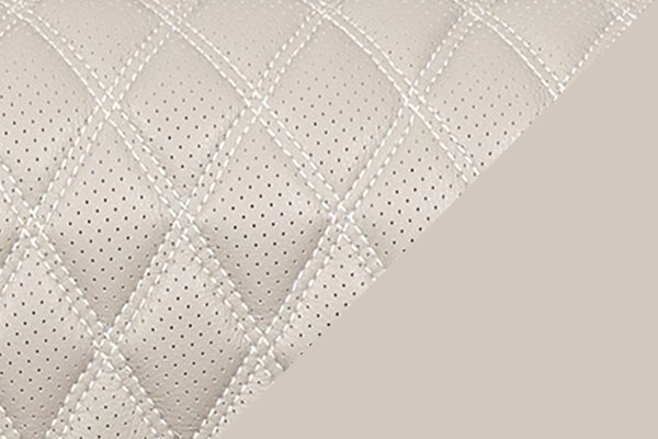 Primer plano de material de sofá reclinable de color beige. 