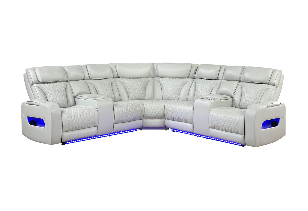 Seccional reclinable blanco con luces LED azules por debajo de los asientos sobre un fondo blanco. 