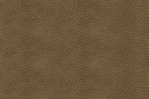 Primer plano de material marrón de sofá y loveseat. 