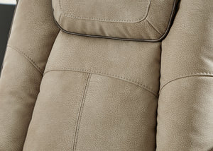 Primer plano del tapizado beige con reposacabezas.