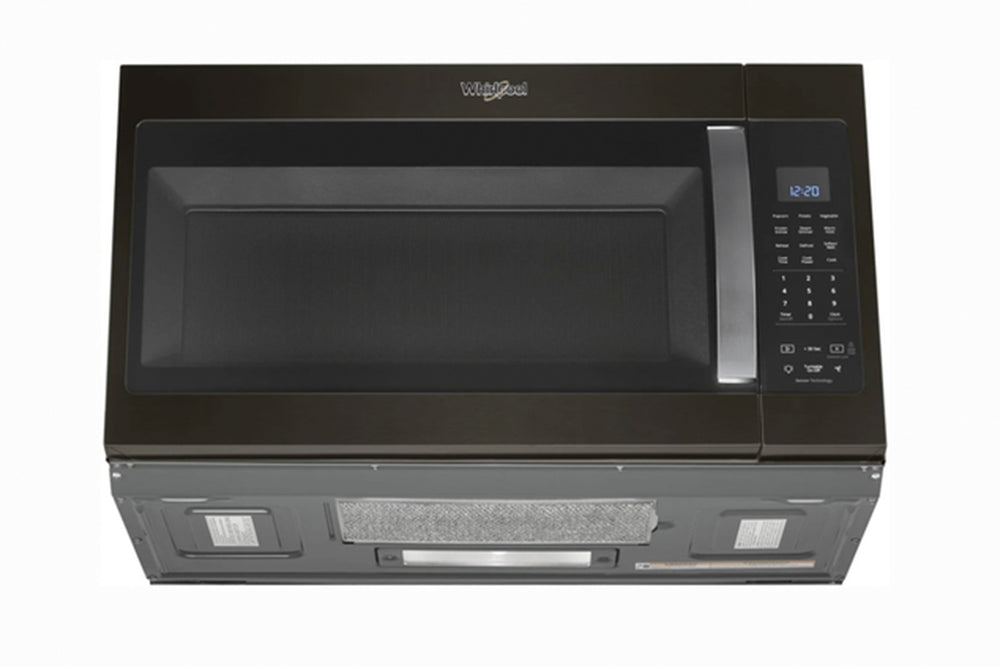 Microondas Whirlpool de encimera en acabado negro con puerta de vidrio, manija vertical y panel de control digital lateral. Ideal para calentar, cocinar y descongelar alimentos de forma rápida y eficiente.