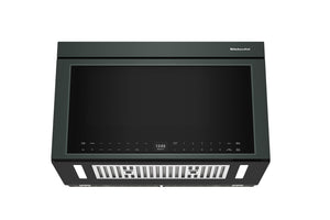 Horno microondas con extractor verde sobre fondo blanco