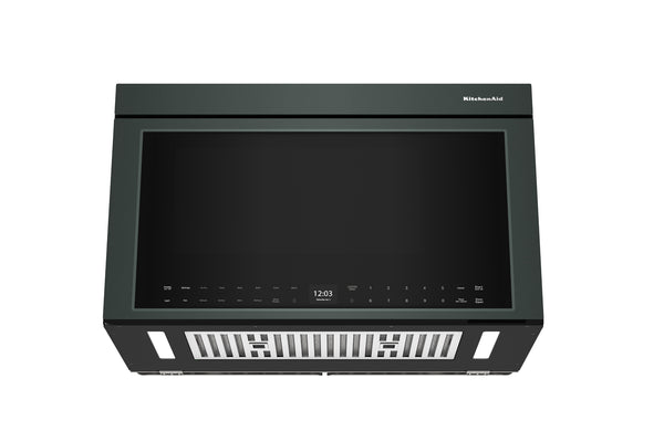 Horno microondas con extractor verde sobre fondo blanco