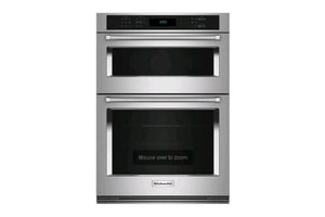 Un horno doble empotrado de acero inoxidable con puertas de cristal negro y un panel de control digital en la parte superior, mostrado sobre un fondo blanco liso.