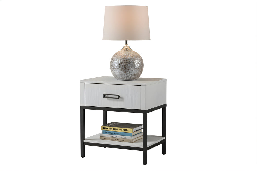 Mesa de noche blanco con una gaveta y un estante por debajo sobre un fondo blanco. 