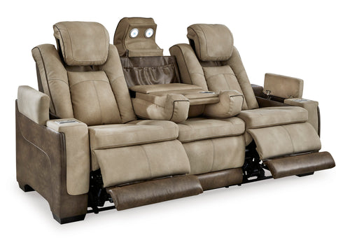 Sofá reclinable tipo home theater tapizado en tela beige y marrón, con reposapiés extendidos, portavasos integrados, compartimentos laterales y consola central con almacenamiento y luces de lectura.
