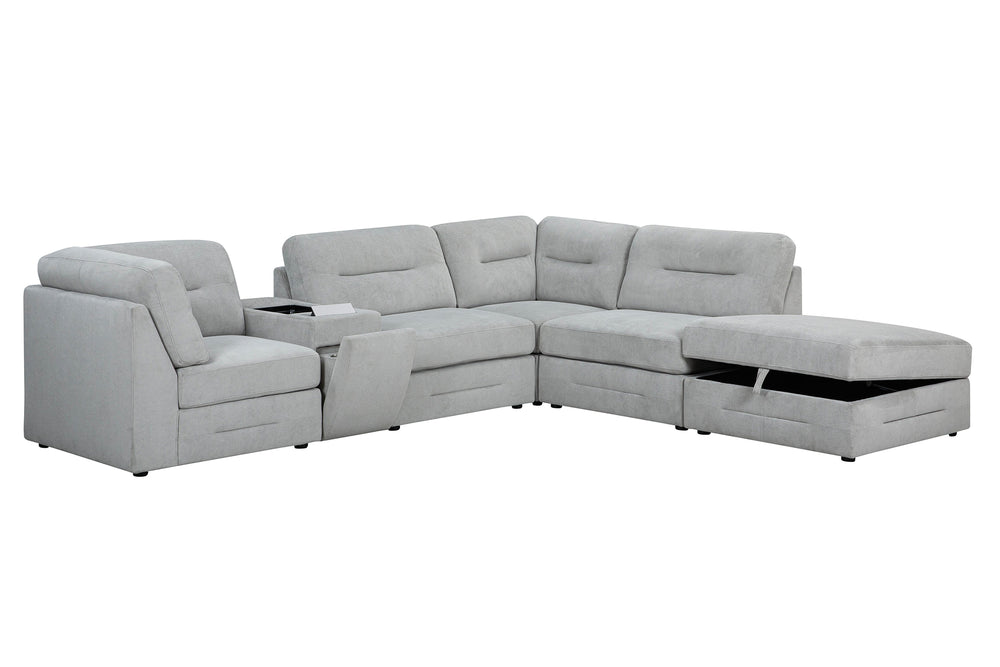 Gray fabric sectional sofa with storage ottoman, adjustable headrests, and center console in modern living room.
