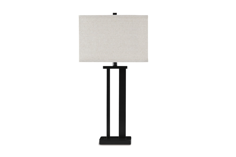 Lámpara de sobremesa con base negra y pantalla blanca sobre fondo blanco.