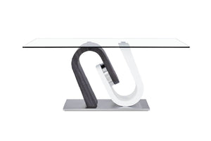 Mesa de comedor moderna de cristal con una base metálica única en forma de U sobre fondo blanco.