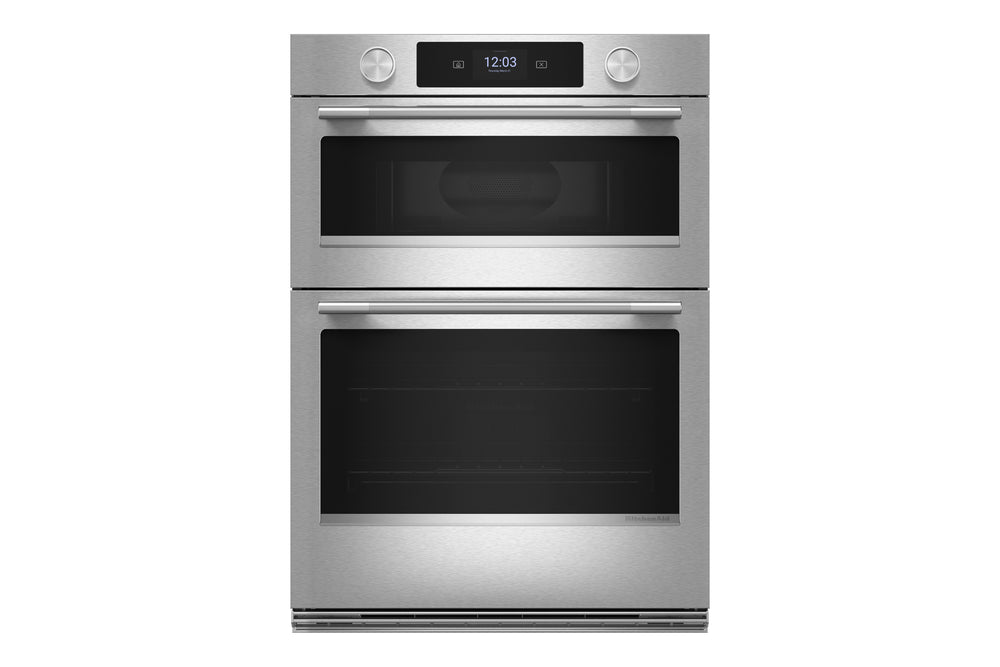 Un horno doble empotrado de acero inoxidable con dos puertas de cristal negro, un panel de control digital superior con dos perillas y manijas horizontales, mostrado sobre un fondo blanco liso.