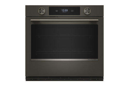 Horno empotrado con acabado metálico en color gris oscuro, pantalla digital y dos mandos de control en el panel superior, sobre un fondo blanco liso.