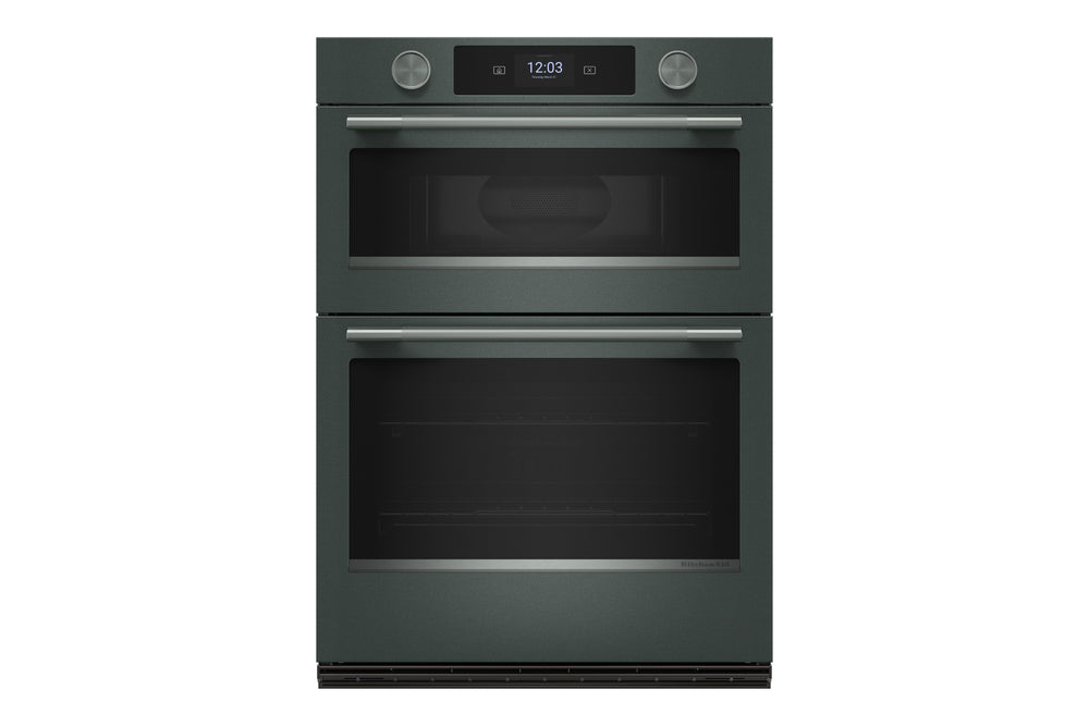 Un horno doble empotrado con acabado en verde y puertas de cristal negro, que cuenta con una pantalla de control digital y dos perillas plateadas en el panel superior, mostrado sobre un fondo blanco liso.
