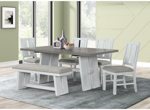 Juego de comedor estilo rústico moderno con mesa rectangular de acabado blanco envejecido, cuatro sillas a juego y banco tapizado. El conjunto combina texturas de madera y tonos neutros para crear un ambiente cálido y acogedor.