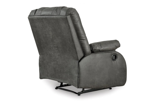 Vista posterior de butaca reclinable de gris sobre un fondo blanco. 