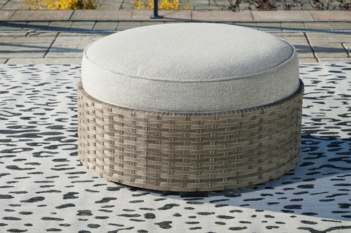Ashley Calworth Ottoman con Cojín