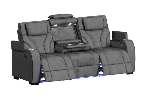 Sofá reclinable de tres plazas en color gris oscuro con consola central abatible, portavasos, luces de lectura LED, compartimentos de almacenamiento e iluminación LED azul en la base. Diseño acolchado moderno con respaldos altos y apoyabrazos amplios.