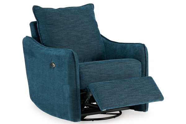 Reclinadora giratoria motorizada azul de tela texturizada estilo contemporáneo, con reposapiés extendido en sala moderna