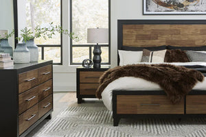 Dormitorio moderno con muebles de madera, que incluye cama y cómodas, en una habitación bien iluminada.