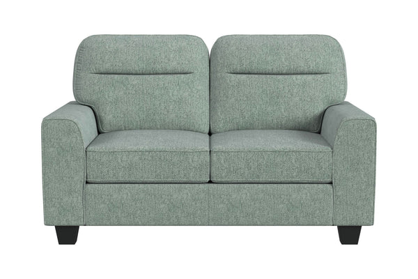 Loveseat de color verde menta sobre un fondo blanco. 