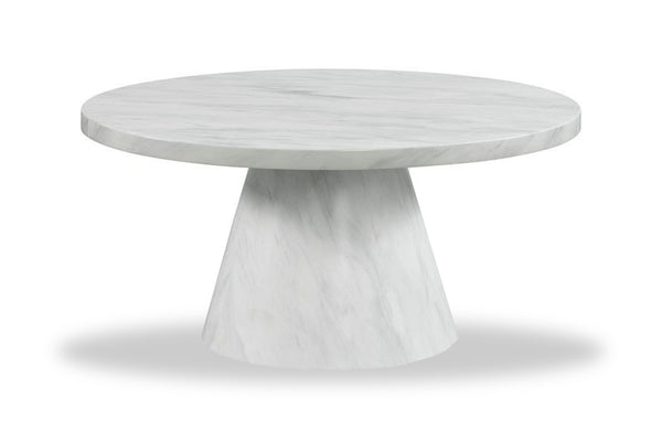 Mesa redonda de comedor de mármol sobre fondo blanco.