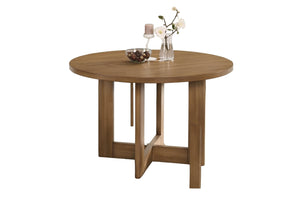 Mesa redonda de madera en tono marrón medio, con base de pedestal geométrica en cruz. Decorada con un florero de cristal con flores blancas, una vela y un tazón con dátiles, sobre un fondo blanco sólido.