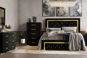 Dormitorio moderno con muebles negros y dorados, que incluyen una cama y una cómoda.