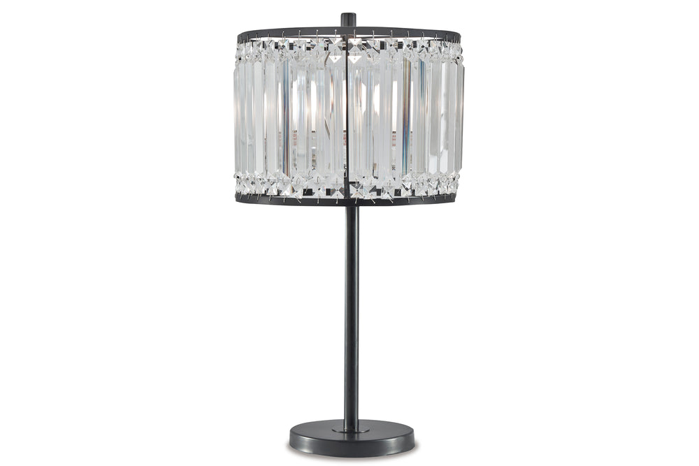 Lámpara de mesa con pantalla de cristal sobre fondo blanco.