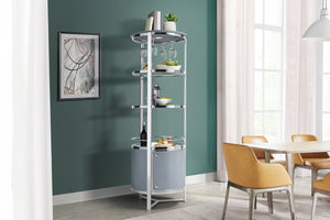 Estantería para vinos de forma redonda de metal con base gris en una sala con objetos decorativos. 