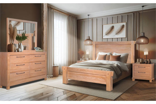 Conjunto de muebles de colores claros y cálidos que incluye una cama, un gavetero con espejo, una mesita de noche y una mesa de noche en una habitación luminosa.