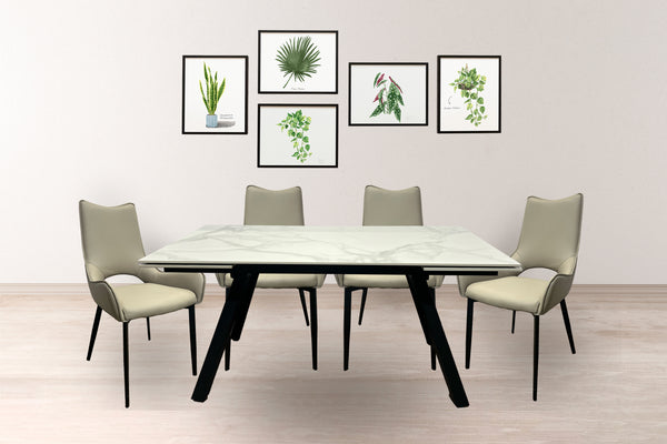 Mesa rectangular con base de madera marrón y con tope de diseño mármol con cuatro sillas de color crema en una sala neutral. 