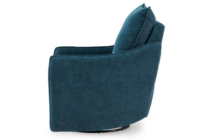 Sillón reclinable y giratorio en tela texturizada azul, visto desde un ángulo lateral sobre fondo blanco