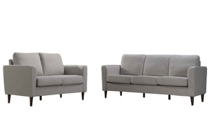 Sofá y loveseat de color gris en una sobre un fondo blanco. 