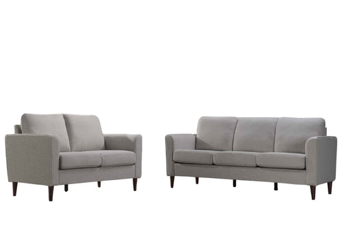 Sofá y loveseat de color gris sobre un fondo blanco. 