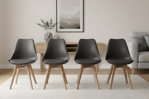 Sala de estar moderna con cuatro sillas grises oscuras, aparador de madera y arte abstracto en la pared.