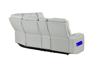 Vista posterior de seccional reclinable blanco con luces LED azules por debajo de los asientos sobre un fondo blanco. 