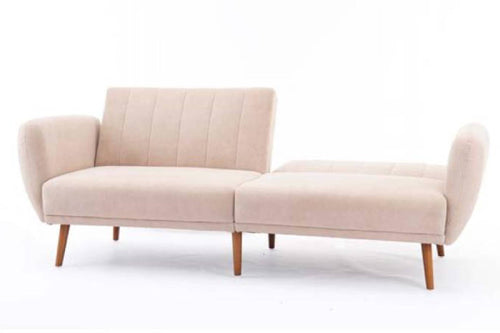 Sofá tipo chaise longue tapizado en tela color beige claro, con respaldo parcial, brazos curvos en los extremos y patas de madera inclinadas. Diseño moderno y compacto, ideal para salas pequeñas o espacios contemporáneos.