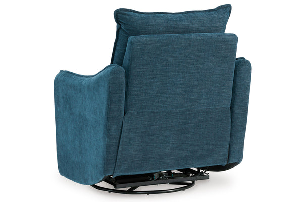 Sillón reclinable y giratorio moderno tapizado en tela texturizada azul, vista posterior en tres cuartos sobre fondo blanco