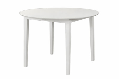 Mesa de comedor redonda y blanca sobre un fondo blanco. 