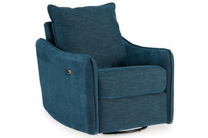 Sillón moderno tapizado en tela texturizada azul con cojín de respaldo a juego sobre fondo blanco.