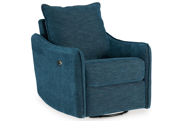 Sillón moderno tapizado en tela texturizada azul con cojín de respaldo a juego sobre fondo blanco.