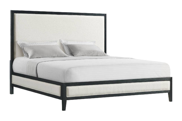 Cama crema con marco negro sobre un fondo blanco. 