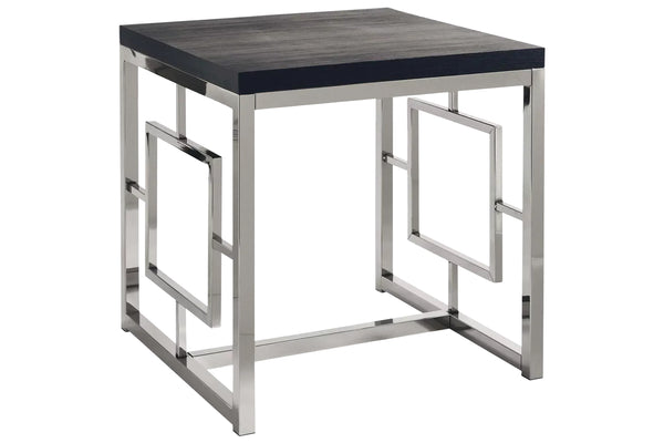 Mesa de esquina con base metálica y tope negro de madera sobre un fondo blanco. 