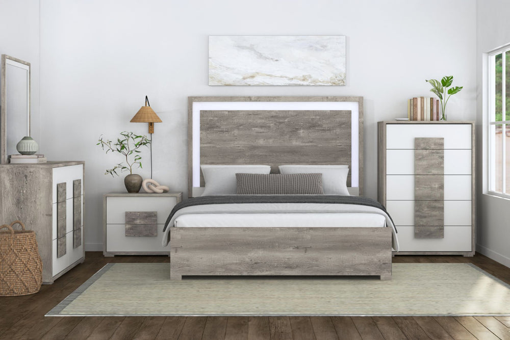 Conjunto de habitación de colores blanco y gris claro de una cama, un gavetero con espejo, un chest y una mesa de noche. 