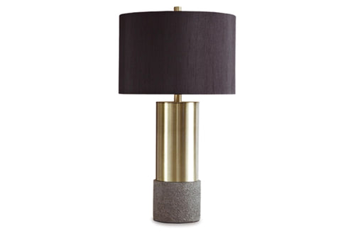 Lámpara de mesa con pantalla negra, sección central dorada y base gris sobre fondo blanco.